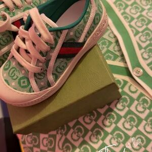 Gucci shoes and the sweater the sweater is a kids size 4/5